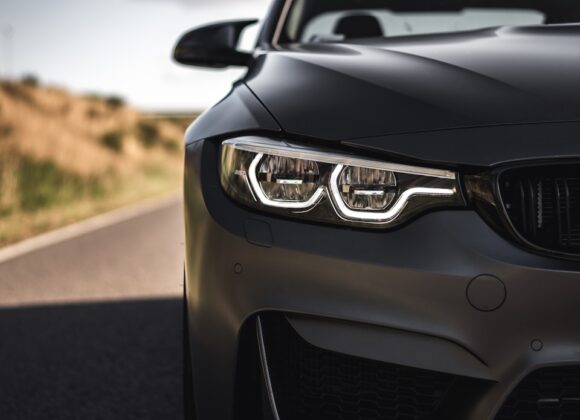 black mercedes benz car on road during daytime